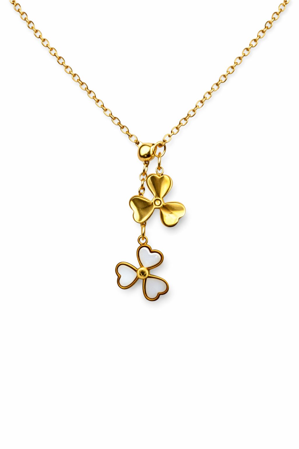 Gold clover pendant necklace for women on marble display – Luvina