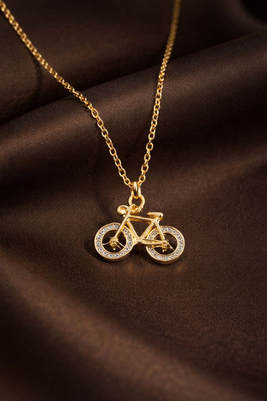 Gold plated bicycle pendant necklace with crystal detailing for women by Luvina
